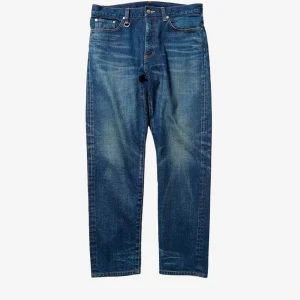 Damaged stretch denim tapered jeans